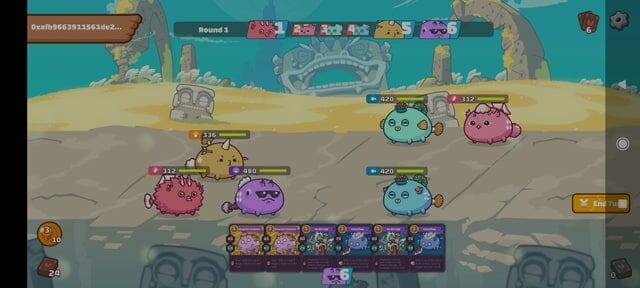 screen of axie infinity battle scene with 3 axies opposing another 3